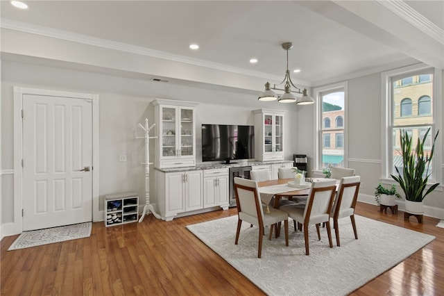 114-116 Main St Unit 114, Milo, NY 14527 - dining room featuring ornamental molding, a chandelier, wood finished floors, and recessed lighting