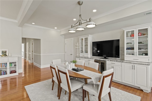 114-116 Main St Unit 114, Milo, NY 14527 - dining room with beverage cooler, light wood-style floors, crown molding, and recessed lighting