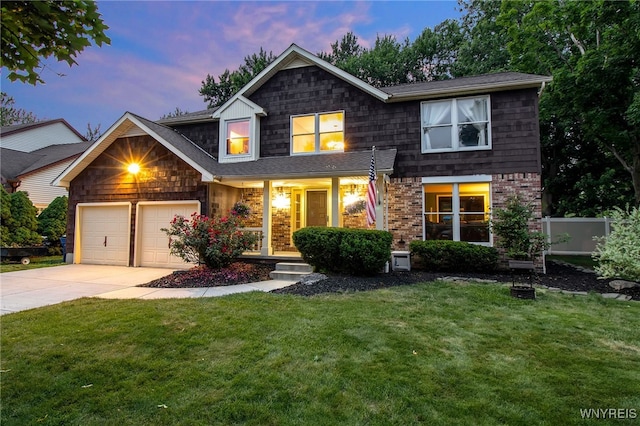 7 Shalamar Ct, Amherst, NY 14068 - view of front facade with driveway, a front yard, a garage, and a porch