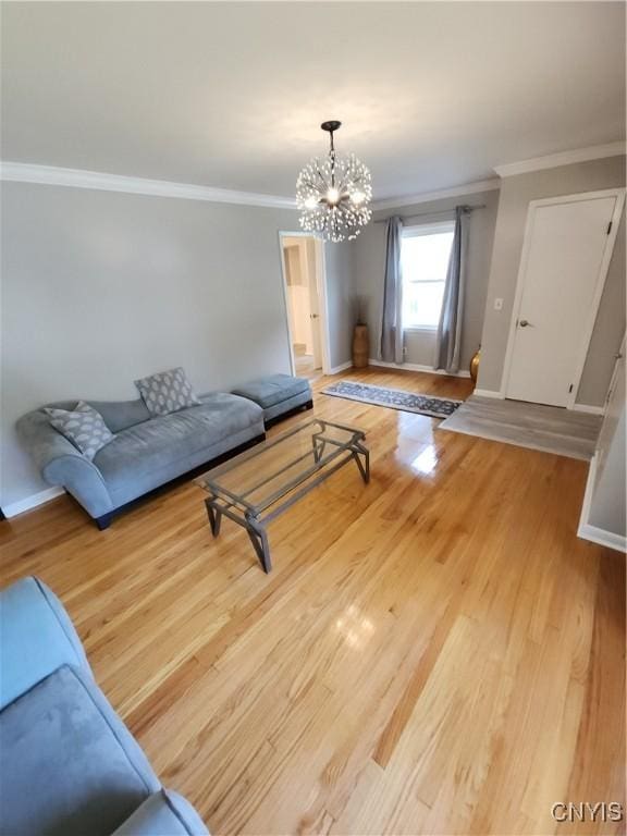 201 Jane Dr, Camillus, NY 13219 - living room with crown molding, a chandelier, and light wood-style flooring