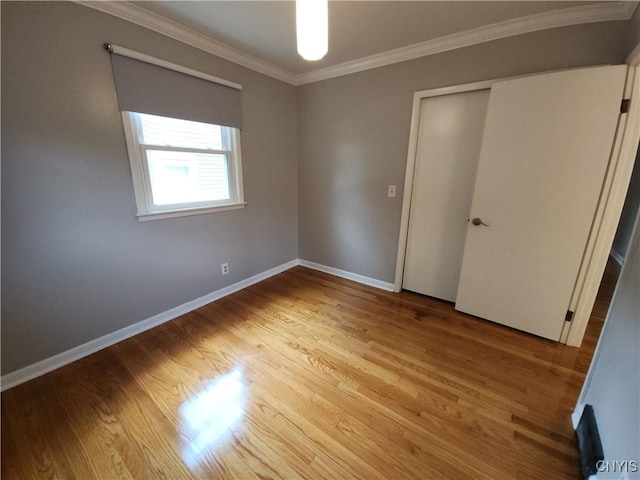 201 Jane Dr, Camillus, NY 13219 - unfurnished room featuring crown molding and light wood finished floors