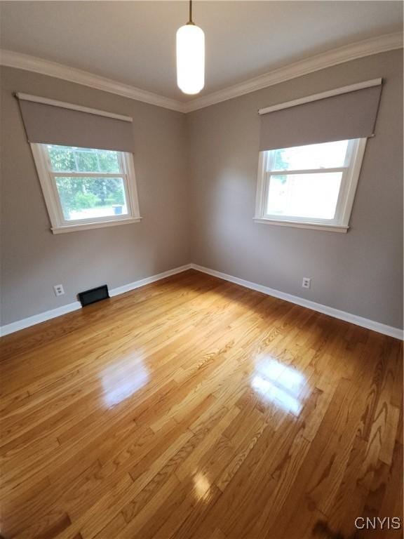 201 Jane Dr, Camillus, NY 13219 - empty room with light wood-style floors and crown molding