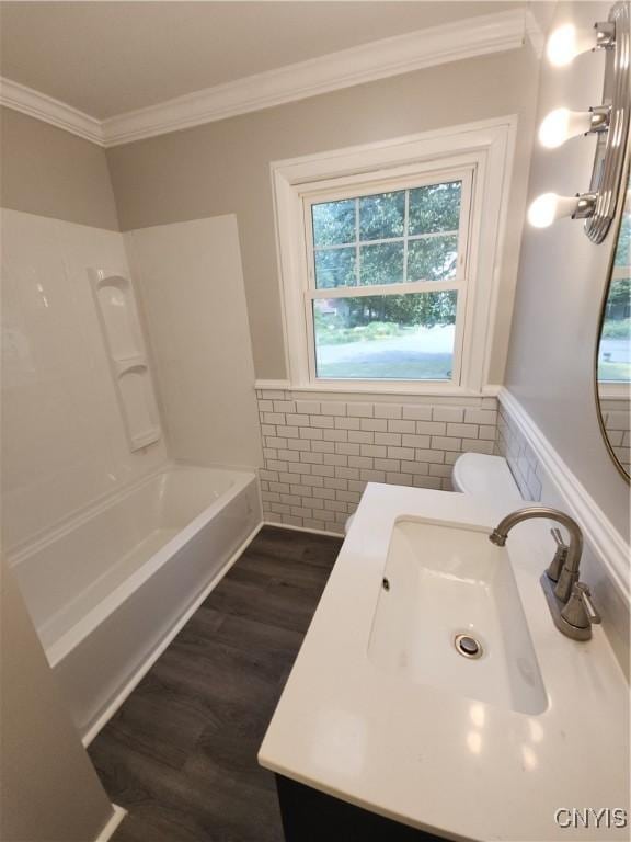 201 Jane Dr, Camillus, NY 13219 - full bath with wainscoting, crown molding, wood finished floors, tile walls, and vanity