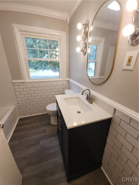 201 Jane Dr, Camillus, NY 13219 - full bath featuring vanity, a wainscoted wall, a bath, ornamental molding, and tile walls