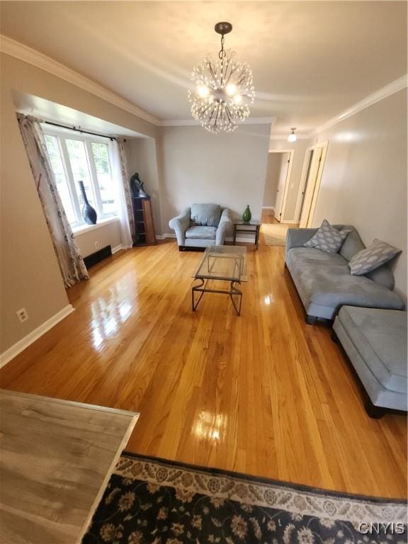 201 Jane Dr, Camillus, NY 13219 - living area with ornamental molding, a chandelier, and light wood-type flooring