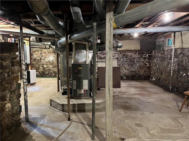 520 Seneca St, Fulton, NY 13069 - unfinished below grade area featuring heating unit