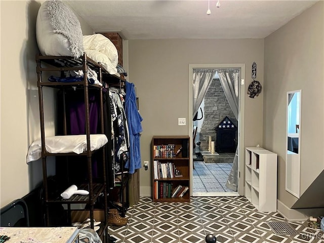 520 Seneca St, Fulton, NY 13069 - bedroom with tile patterned floors and baseboards