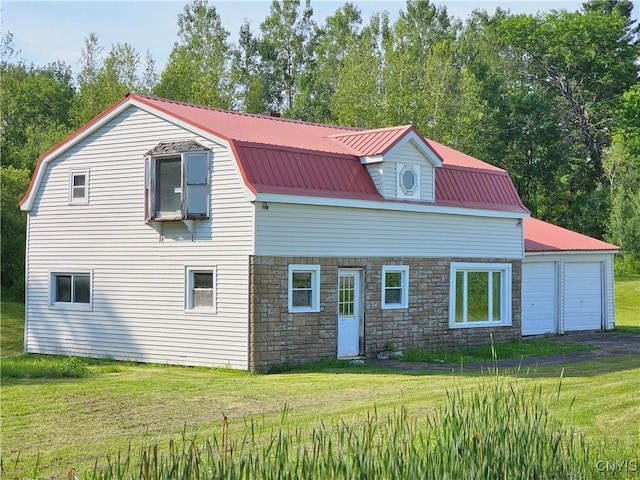 7131 State Route 8, Deerfield, NY 13502 - view of side of property featuring a gambrel roof, a yard, stone siding, and a metal roof