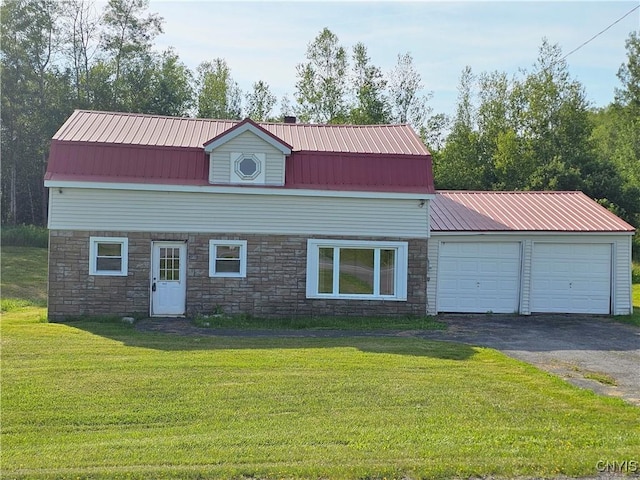 7131 State Route 8, Deerfield, NY 13502 - view of front facade featuring stone siding, a front yard, and a metal roof