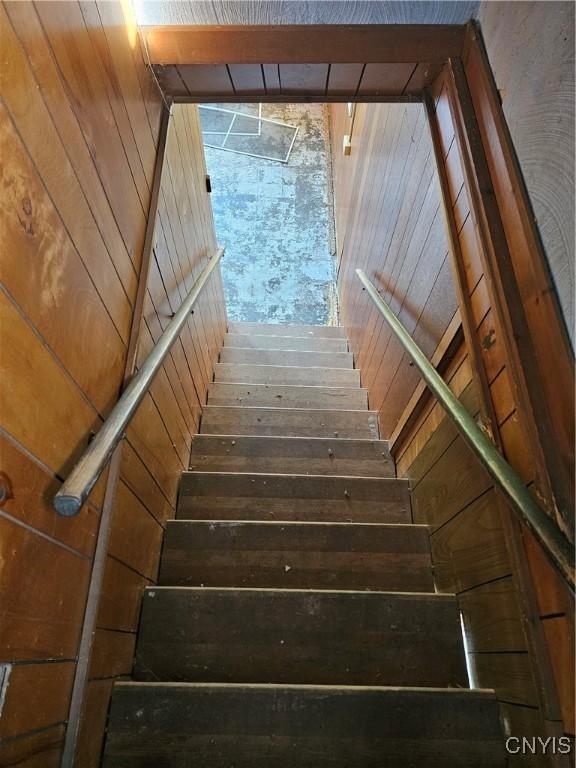 7131 State Route 8, Deerfield, NY 13502 - stairway featuring wooden walls