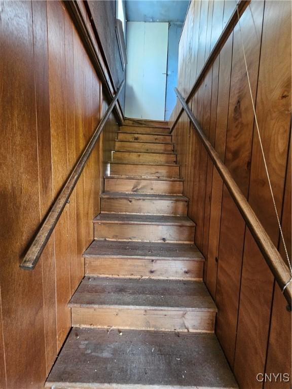 7131 State Route 8, Deerfield, NY 13502 - stairway featuring wood walls