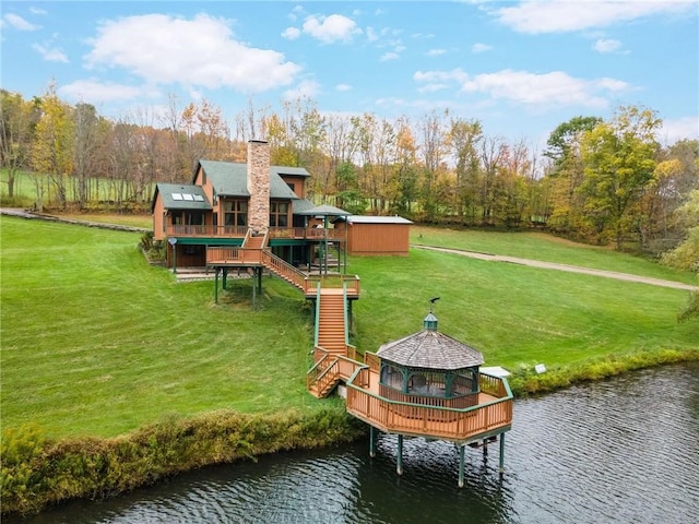 734 Post Rd, Franklin, NY 13775 - back of property with stairway, a gazebo, a yard, a chimney, and a deck with water view