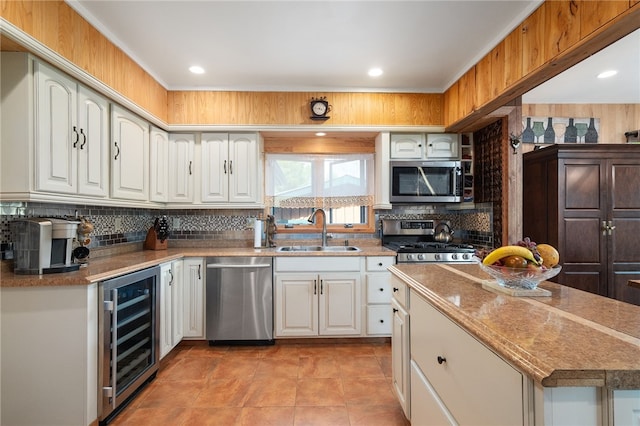 734 Post Rd, Franklin, NY 13775 - kitchen with stainless steel appliances, beverage cooler, tasteful backsplash, white cabinets, and light tile patterned flooring