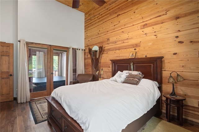 734 Post Rd, Franklin, NY 13775 - bedroom featuring high vaulted ceiling, access to outside, wooden walls, french doors, and wood finished floors