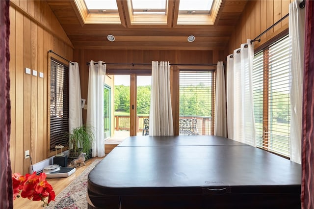 734 Post Rd, Franklin, NY 13775 - game room featuring wood walls, wood finished floors, and a skylight