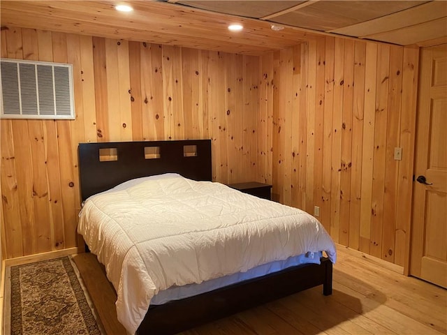 734 Post Rd, Franklin, NY 13775 - bedroom featuring wood finished floors, wooden walls, and recessed lighting