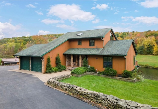 734 Post Rd, Franklin, NY 13775 - view of front of home featuring an attached garage, a front lawn, and a shingled roof