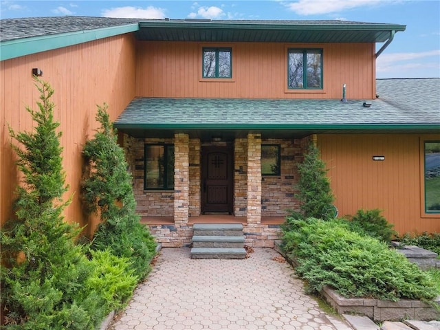734 Post Rd, Franklin, NY 13775 - view of front of house with a shingled roof, covered porch, and stone siding