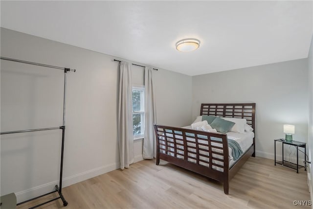 3564 Swartout Rd, Owasco, NY 13021 - bedroom with wood finished floors and baseboards