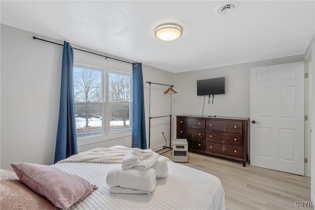3564 Swartout Rd, Owasco, NY 13021 - bedroom with light wood-style floors
