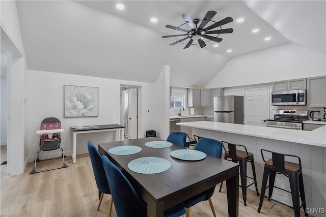 3564 Swartout Rd, Owasco, NY 13021 - dining space featuring lofted ceiling, a ceiling fan, light wood finished floors, and recessed lighting