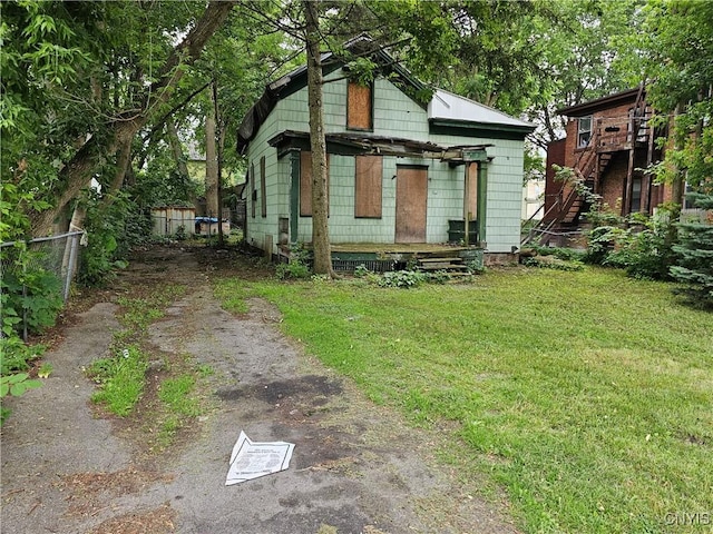 717 Oswego St, Utica, NY 13502 - view of front facade with driveway