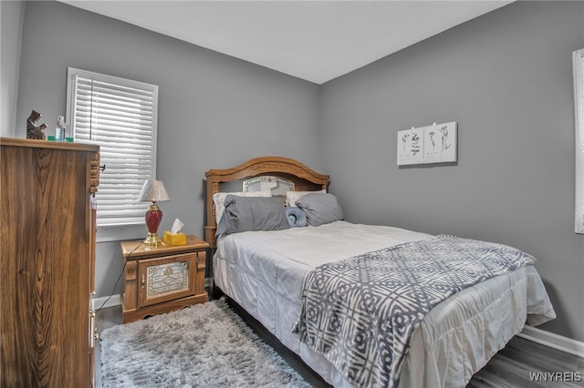 245 Tacoma Ave, Buffalo, NY 14216 - bedroom with baseboards and wood finished floors
