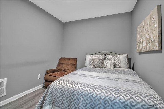 245 Tacoma Ave, Buffalo, NY 14216 - bedroom with wood finished floors and baseboards