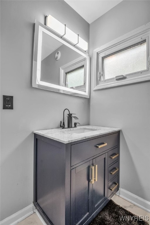 245 Tacoma Ave, Buffalo, NY 14216 - bathroom with vanity and baseboards