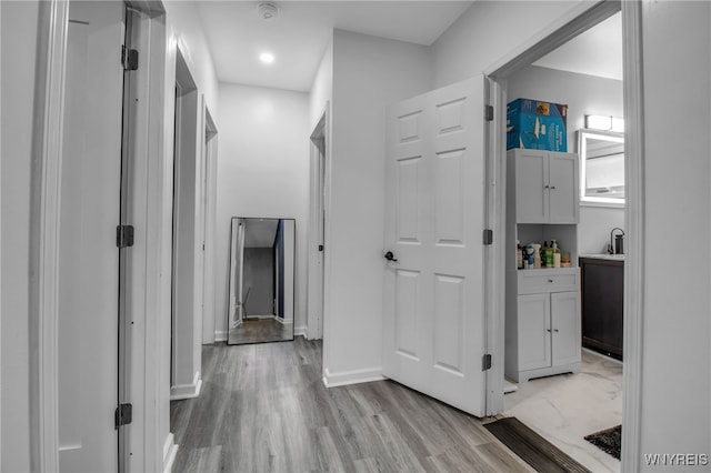 245 Tacoma Ave, Buffalo, NY 14216 - hall featuring light wood finished floors and recessed lighting