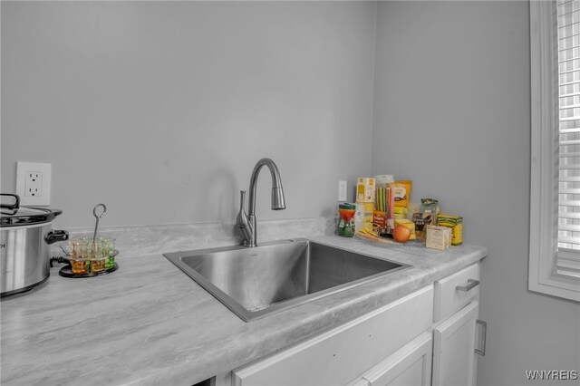245 Tacoma Ave, Buffalo, NY 14216 - kitchen with light countertops and white cabinetry