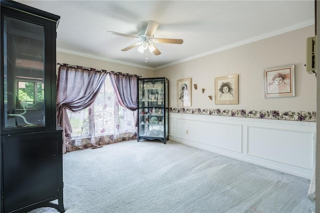 47 Edenfield Rd, Penfield, NY 14526 - unfurnished room with carpet flooring, a ceiling fan, healthy amount of natural light, crown molding, and wainscoting