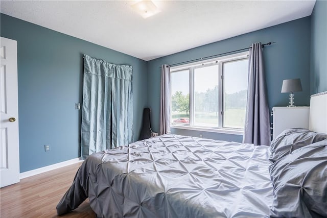47 Edenfield Rd, Penfield, NY 14526 - bedroom with wood finished floors and baseboards
