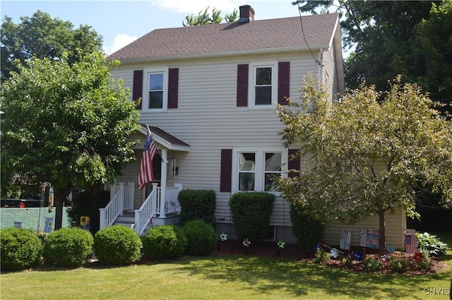 106 Mackay Ave, Camillus, NY 13219 - view of front of property with a front yard and a chimney