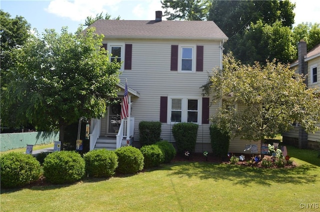 106 Mackay Ave, Camillus, NY 13219 - view of front of property with a front yard and a chimney