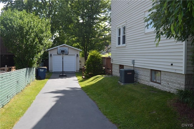 106 Mackay Ave, Camillus, NY 13219 - view of yard featuring a garage, an outbuilding, and concrete driveway
