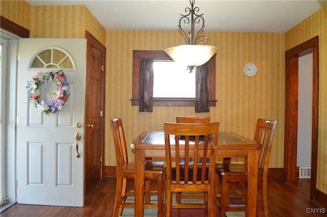 106 Mackay Ave, Camillus, NY 13219 - dining space featuring wallpapered walls and dark wood finished floors