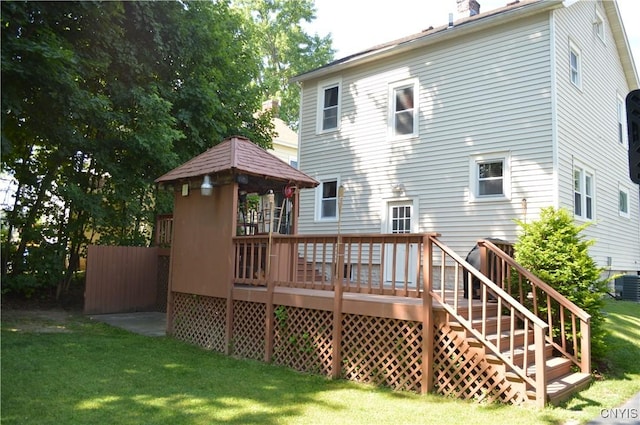 106 Mackay Ave, Camillus, NY 13219 - back of property featuring a gazebo, a yard, a chimney, and a deck