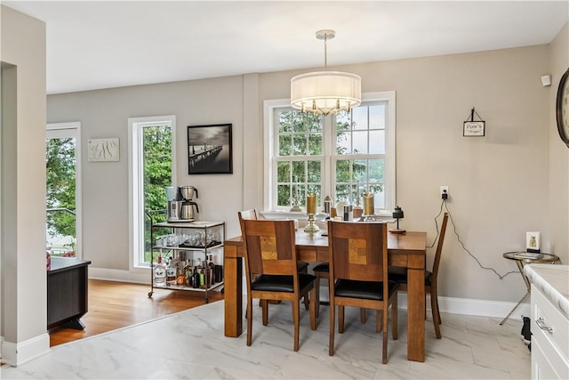 82 Rt 54 E Lake Rd, Milo, NY 14527 - dining room featuring healthy amount of natural light and a chandelier