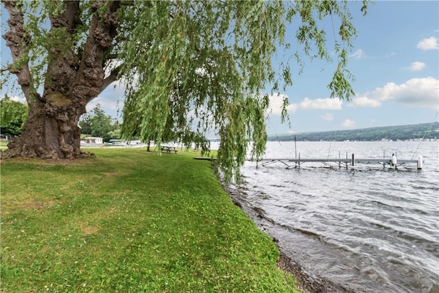 82 Rt 54 E Lake Rd, Milo, NY 14527 - view of green lawn with a boat dock and a water view