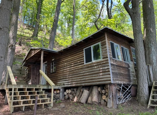 1677 Long Point Beach Rd, Torrey, NY 14527 - view of property exterior with stairs
