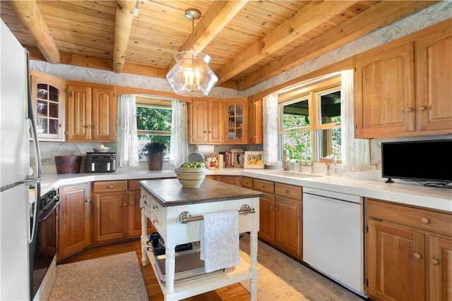 1677 Long Point Beach Rd, Torrey, NY 14527 - kitchen with white appliances, a wood ceiling with exposed beams, healthy amount of natural light, and tasteful backsplash
