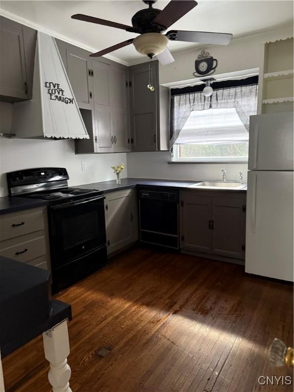 11 Brookline Dr, Utica, NY 13501 - kitchen with black appliances, dark wood-type flooring, dark countertops, and ceiling fan