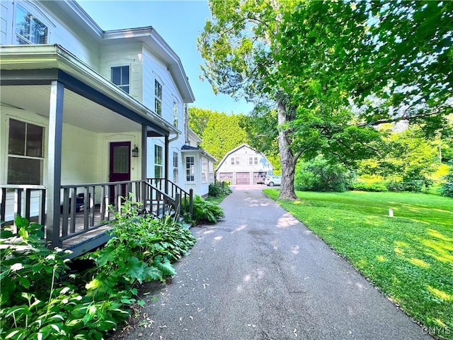 1765 W Rd, Oneida, NY 13421 - view of side of home featuring a yard and an outbuilding