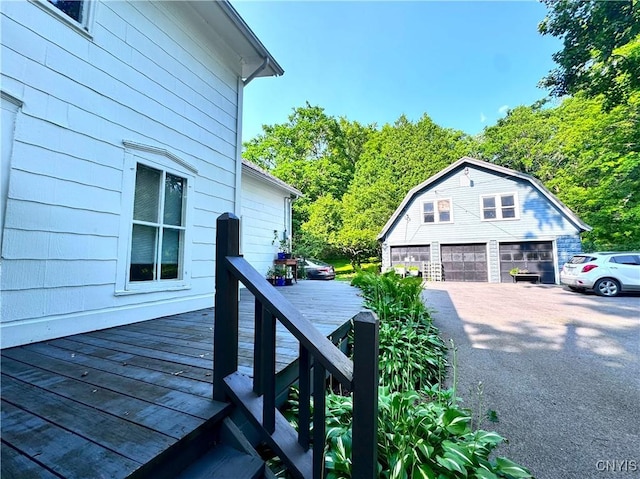 1765 W Rd, Oneida, NY 13421 - deck featuring a garage and an outdoor structure