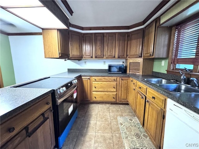 1765 W Rd, Oneida, NY 13421 - kitchen with stainless steel appliances, dark countertops, crown molding, and light tile patterned flooring