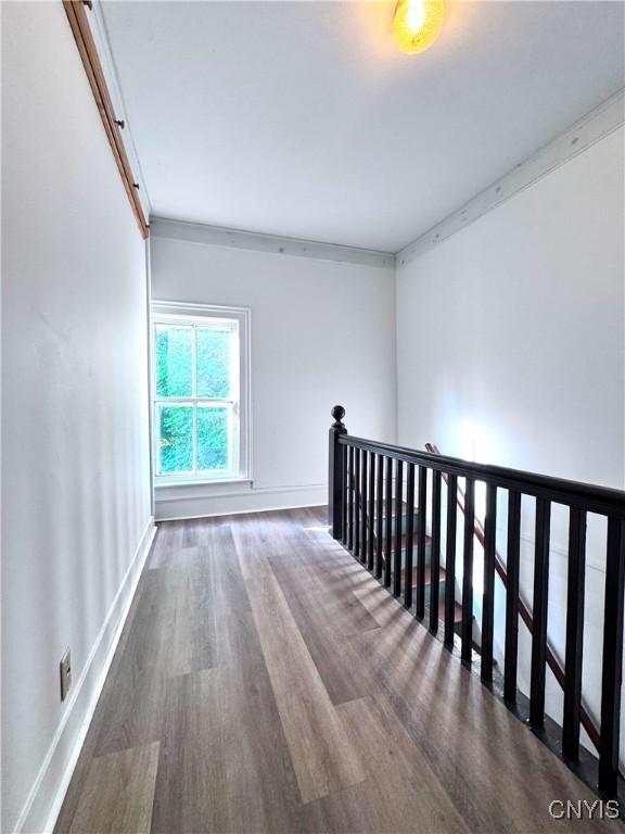 1765 W Rd, Oneida, NY 13421 - spare room with wood finished floors and baseboards