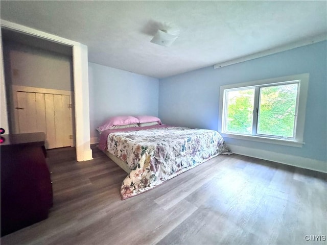 1765 W Rd, Oneida, NY 13421 - bedroom featuring wood finished floors and baseboards