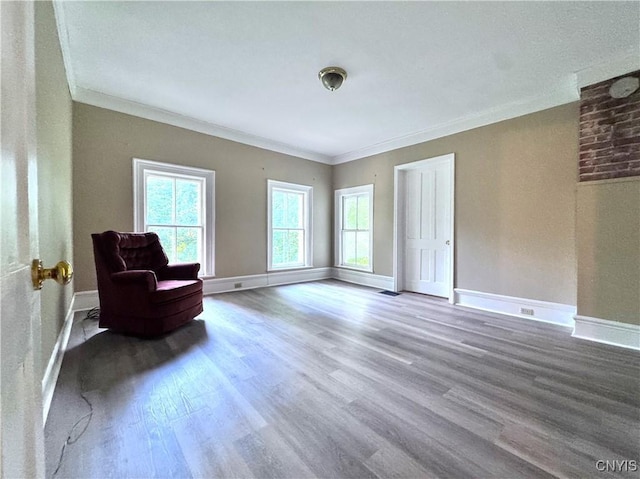 1765 W Rd, Oneida, NY 13421 - sitting room with wood finished floors and crown molding