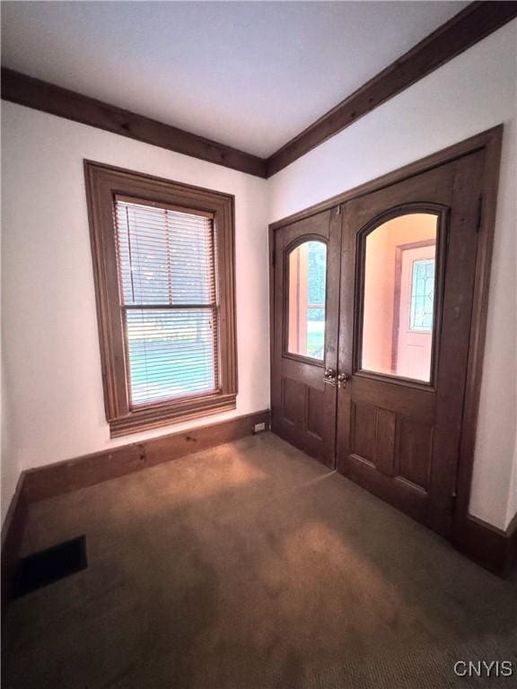 1765 W Rd, Oneida, NY 13421 - carpeted foyer entrance featuring plenty of natural light